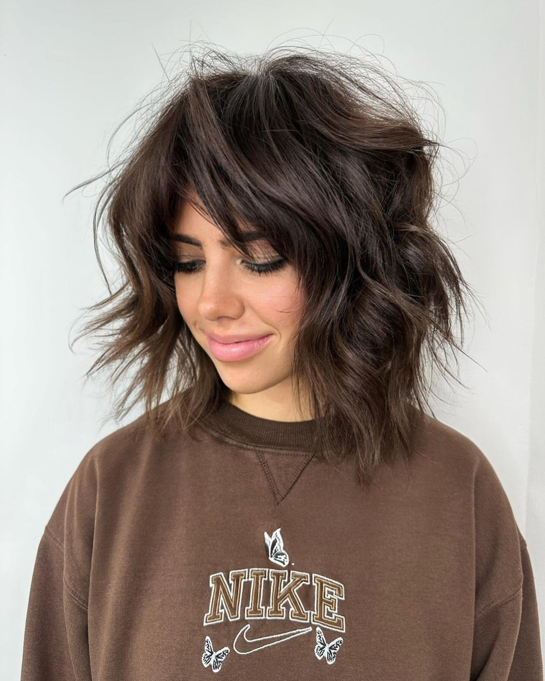 15 Fresh Short Layered Haircuts with Bangs 2026
