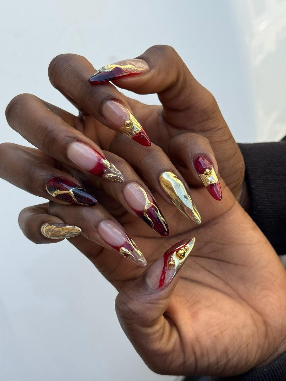 15 Red and Gold Nail Ideas That Shine Bright