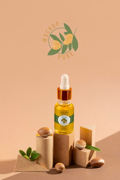 Free Argan Oil Cosmetic Bottle Mock-Up With Wooden-Shaped Podium And Kernels Psd