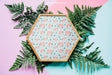 Free Botanical Mockup With Hexagonal Frame On Leaves Psd
