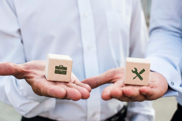 Free Businessmen Holding Dices With Company Ideas Psd