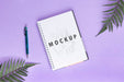 Free Desk Concept With Notebook And Pen On Table Psd