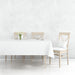 Free Dining Table Mockup With White Cloth And Wooden Chairs Psd