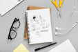 Free Flat Lay Of Desk Surface With Earphones And Notebooks Psd