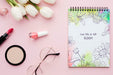 Free Flat Lay Of Notebook With Tulips And Make-Up Essentials Psd