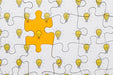 Free Flat Lay Puzzle With Light Bulbs Psd