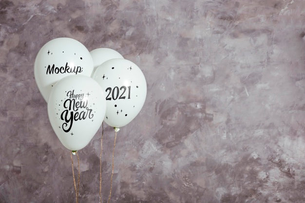 Free Front View Of Mock-Up Balloons For New Year Psd