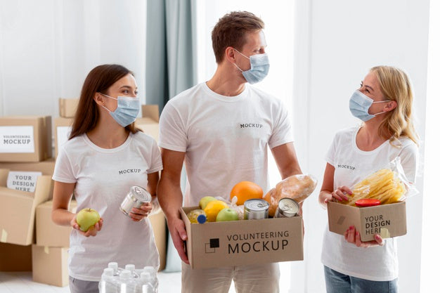 Free Front View Of Volunteers With Medical Masks Preparing Provision Donations Psd