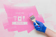 Free Hand Holding A Brush With Pink Colour Psd