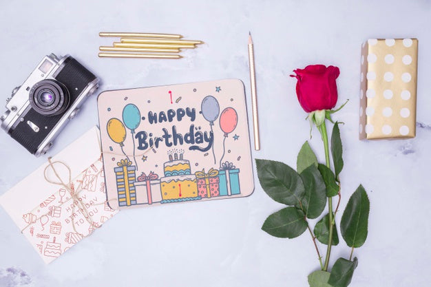 Free Happy Birthday Mock-Up With Rose And Retro Camera Psd