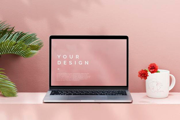 Free Laptop Mockup With A Pastel Pink Wall Psd