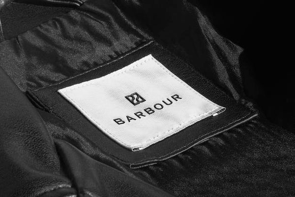 Free Logo Mockup Black Leather Jacket Label Psd