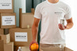 Free Male Volunteer Holding Provisions For Donation Psd