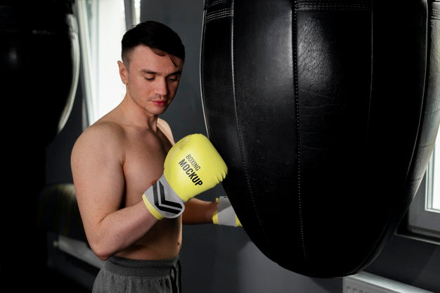 Free Man Wearing Boxing Gloves Mock-Up Psd