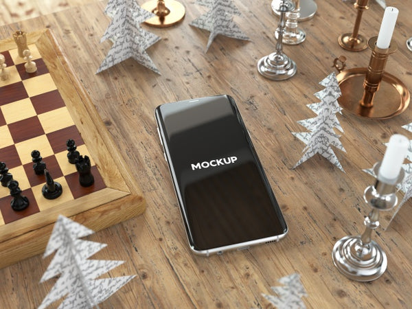 Free Mobile Phone On Table With Chest Mock Up Design Psd