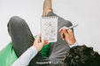 Free Mock Up With Relaxed Man Drawing On The Notebook Psd