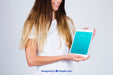 Free Mockup Concept Of Woman Looking At Tablet Psd