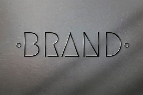Free Mockup Of 3D Metallic Logo On Scratched Metallic Surface Psd