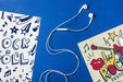 Free Paper Mockup With Earphones In Middle Psd