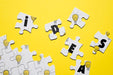 Free Puzzle Concept With Letters And Light Bulbs Psd