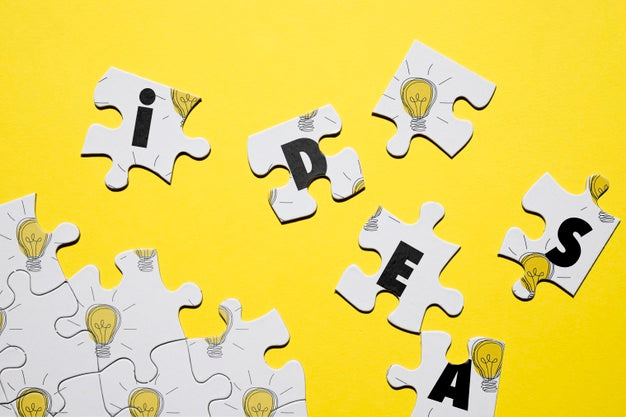 Free Puzzle Concept With Letters And Light Bulbs Psd