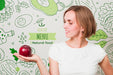 Free Smiling Woman Holding An Apple Psd