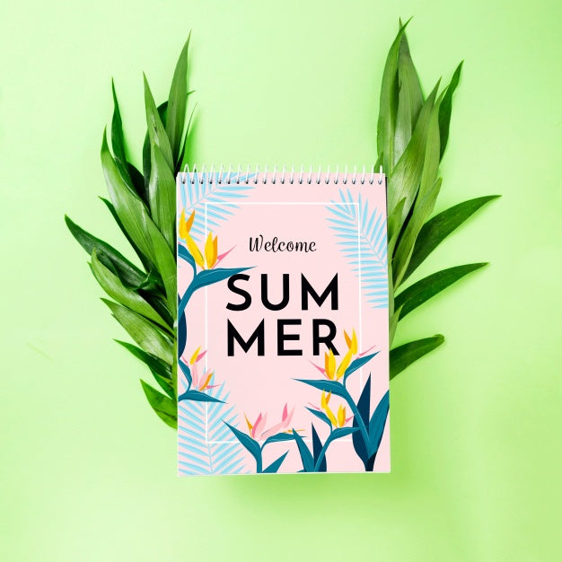 Free Spiral Notepad Mockup On Tropical Leaves Psd