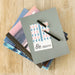 Free Stack Of Agenda On Desk With Pen On Top Psd