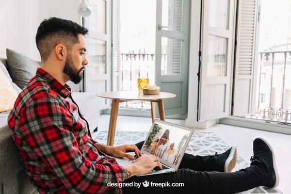 Free Technology Mockup With Man Using Laptop Psd