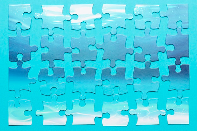 Free Top View Arrangement With Pieces Of Puzzle Psd
