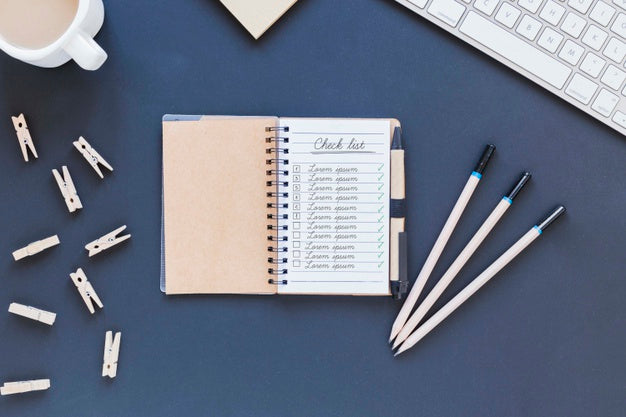 Free Top View Notepad With To Do List On The Desk Psd