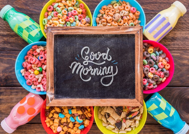 Free Top View Of Chalkboard And Cereal Bowls On Wooden Table Psd