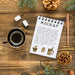 Free Top View Of Notebook With Coffee And Spruce Branches Psd