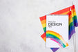 Free Top View Of Notebook With Rainbow Flags Psd