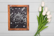 Free Top View Of Tulips Bouquet With Blackboard Psd