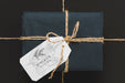 Free Top View Of Wrapped Present With Tag Psd