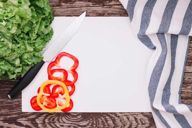 Free Top View Peppers On Table Psd