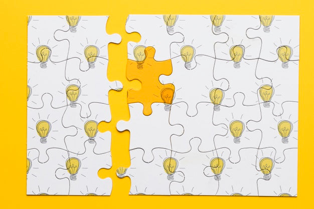 Free Top View Puzzle With Light Bulbs Psd