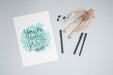 Free Top View Wooden Doll With Pens Psd