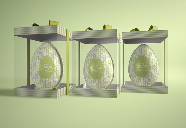 Free Transparent Boxes With Easter Eggs On Table Psd