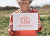 Free Woman Holding A Meditation Center Logo Sign Psd