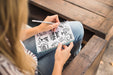 Free Woman Writing On Notepad Mockup Psd